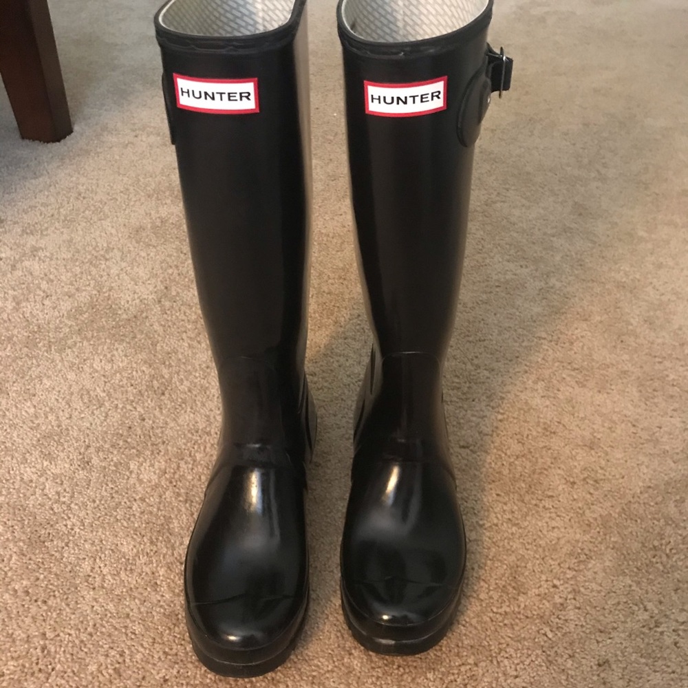 Tall glossy black hunter rainboots